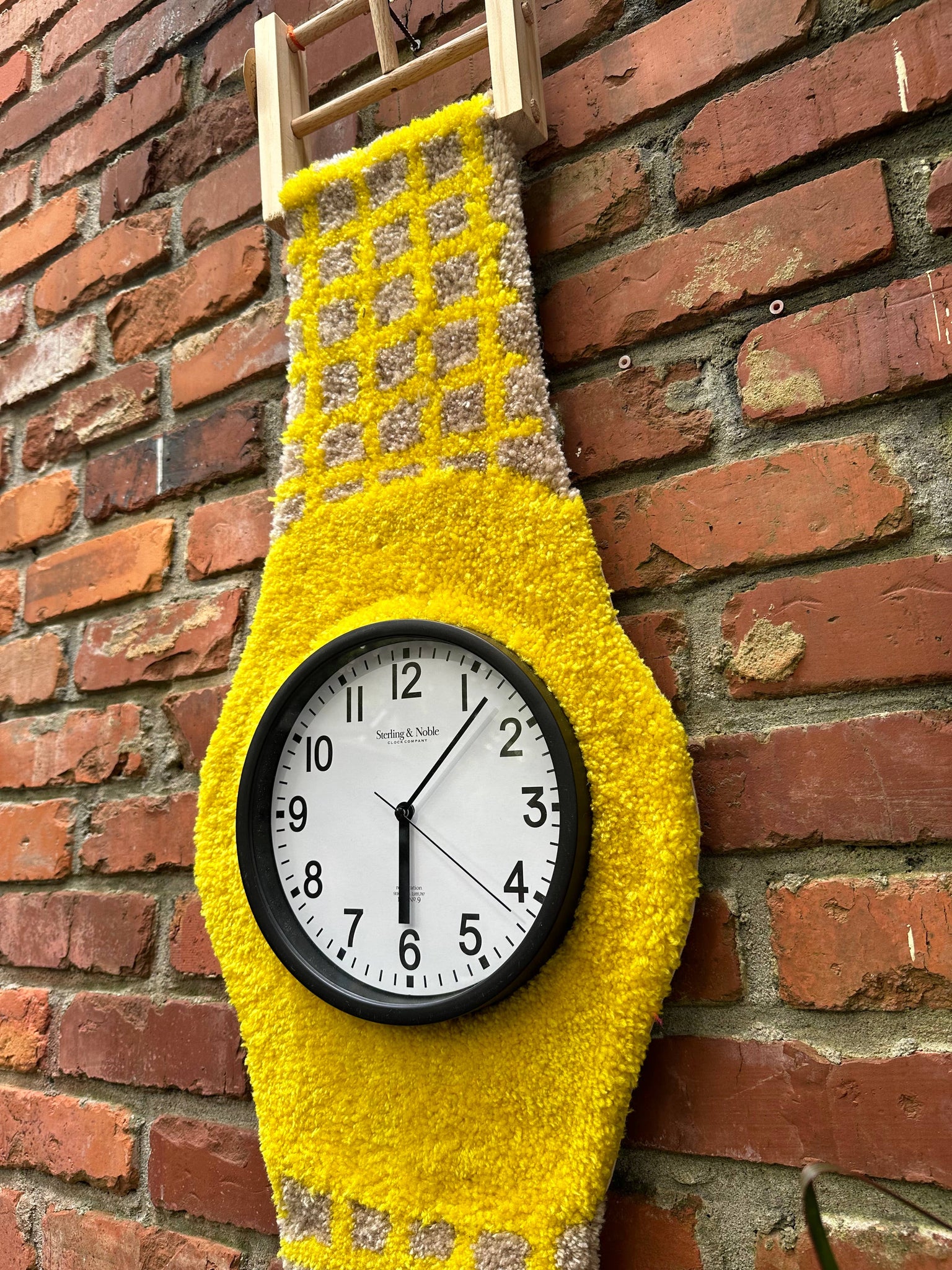 Tufted wall watch