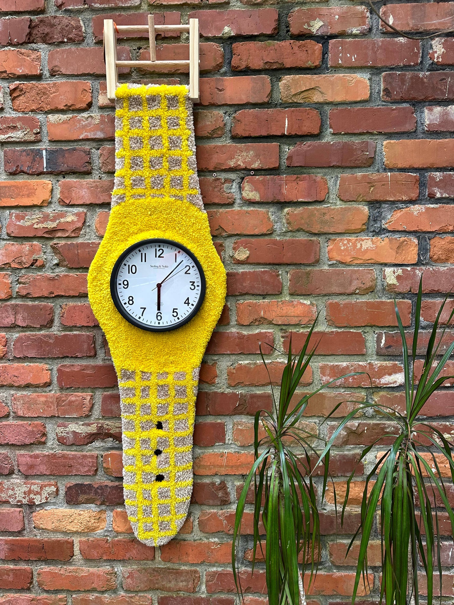 Tufted wall watch